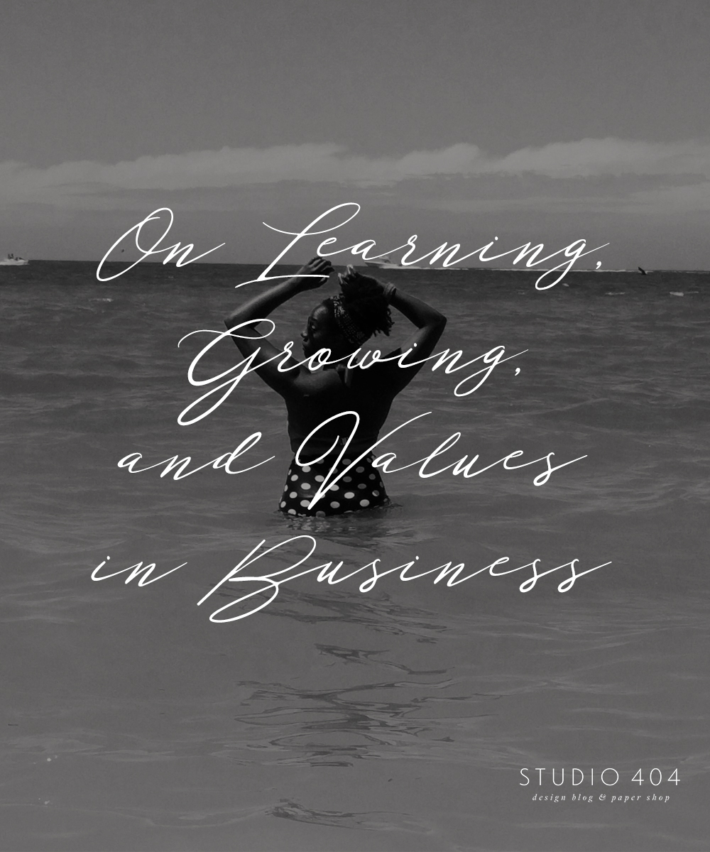 Learning, Growing, and Values in Business Text Overlay on Black and White Photo of Author at Beach