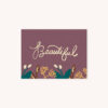The word beautiful handlettered in creme on an aubergine purple background with matching fall floral illustrations on the bottom