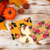 Fall botanical notecards on wooden table with pumpkin and fall leaves