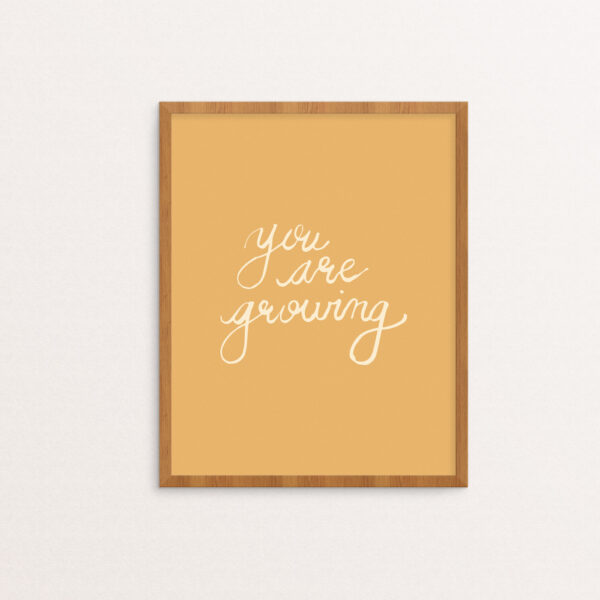 You Are Growing hand-lettered in creme on a dandelion yellow background