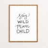 Stay Wild Moon Child Handlettered in Black on White Paper in a Wooden Frame