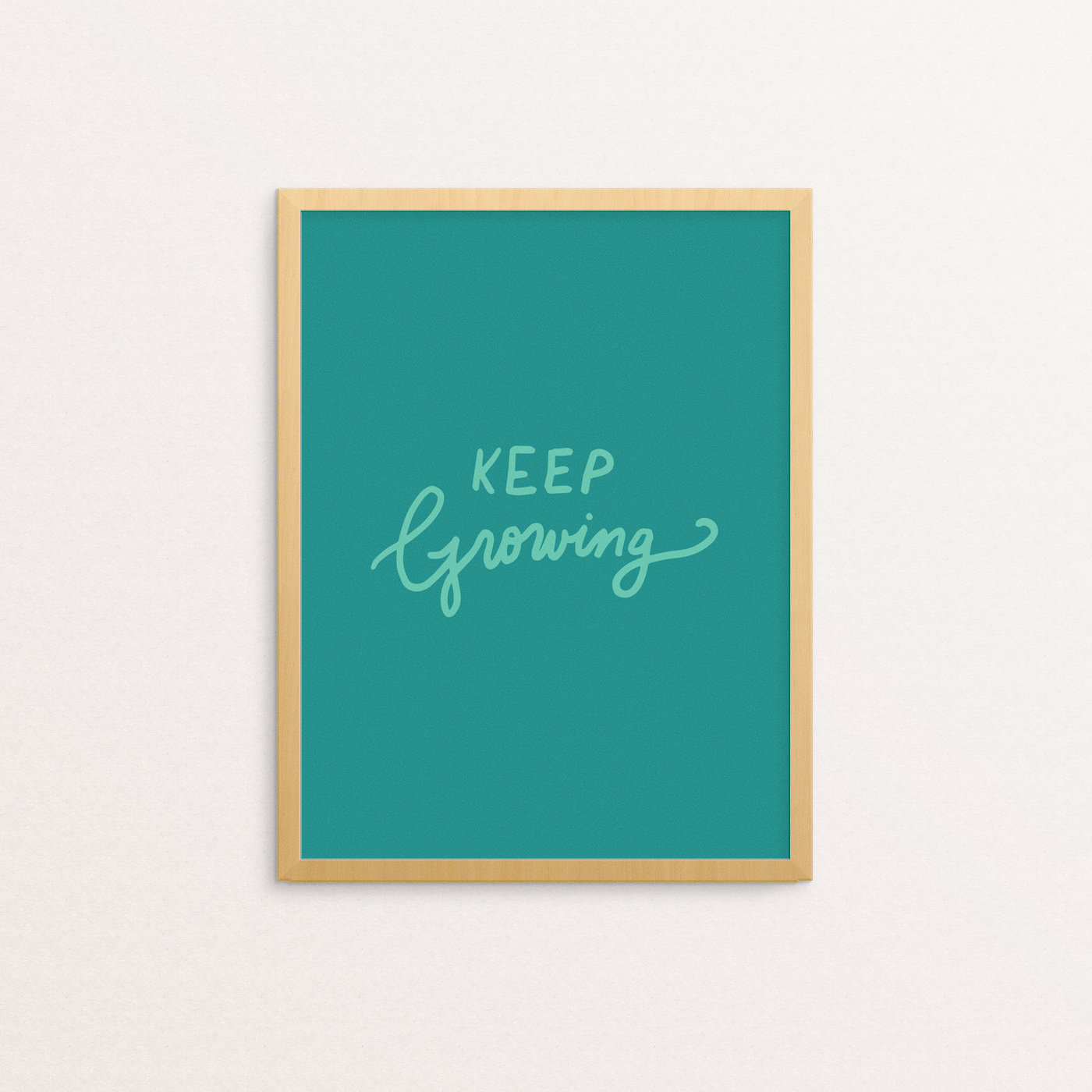 Art print with "Keep Growing" hand lettered in olive green on a jade green background