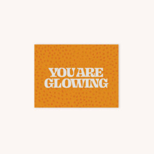 Card that says You are Glowing with a orange abstract dotted background
