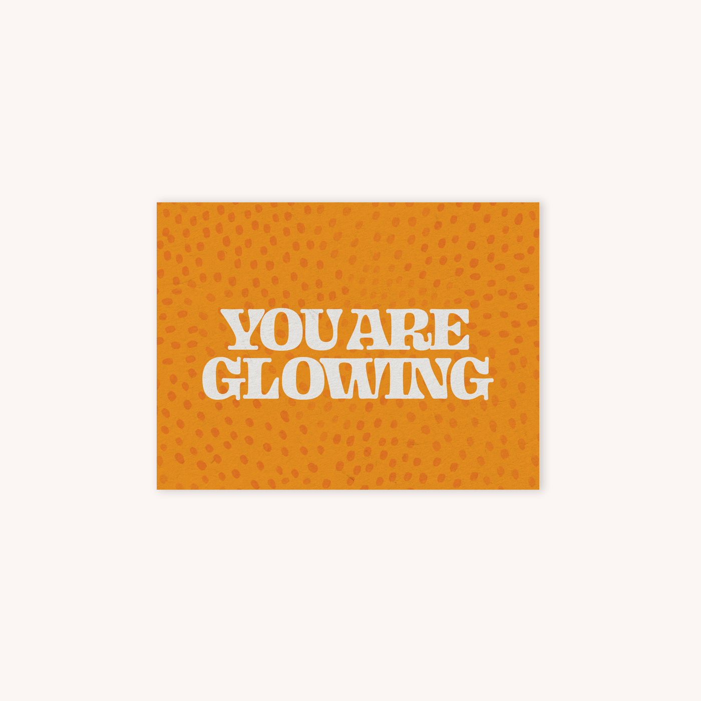 Card that says You are Glowing with a orange abstract dotted background